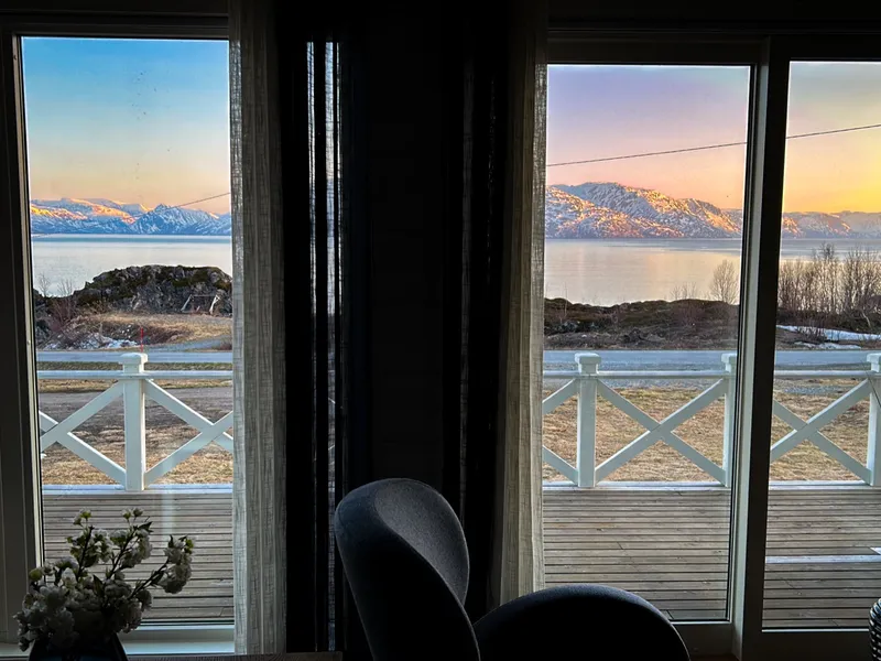 The view from the camp at sunset, fjord and mountains